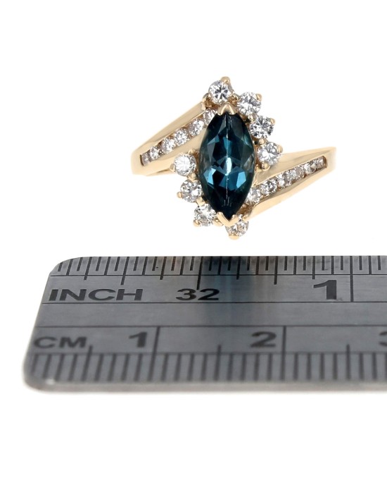 London Blue Topaz and Diamond Bypass Ring in Yellow Gold